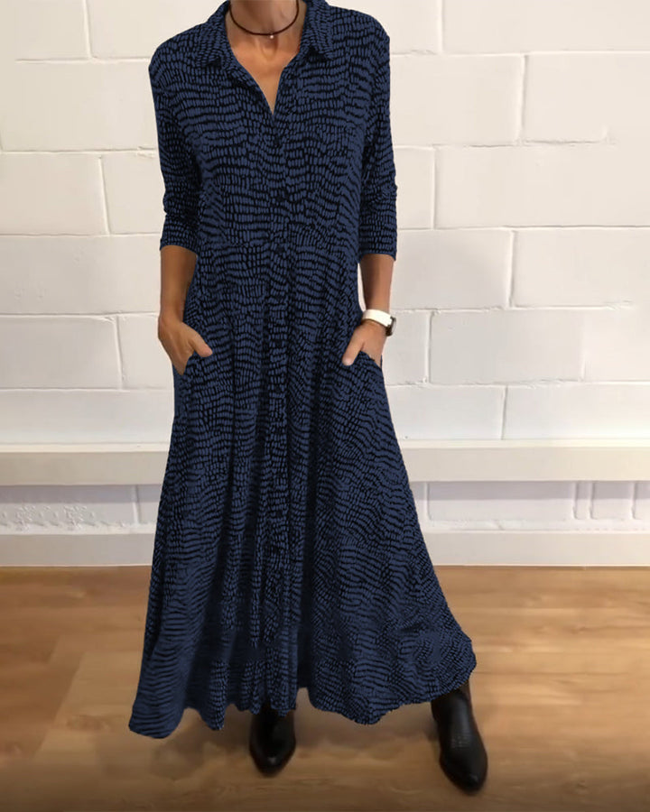 Blue patterned relaxed button-front maxi shirt dress with V collar and 3/4 sleeves