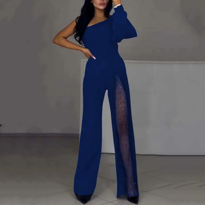 Blue one-shoulder flared romper with sheer side panel and dramatic wide-leg fit