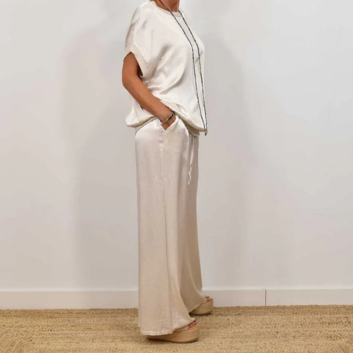 White short-sleeve blouse and wide-leg pants set with elastic waist