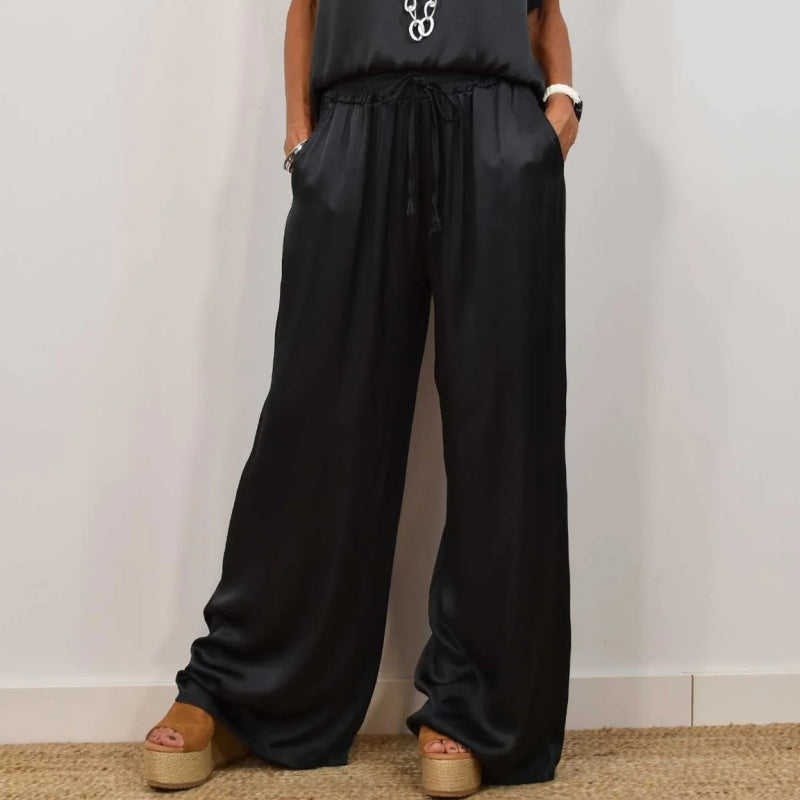 Black wide-leg pants with drawstring waist and short-sleeve blouse set
