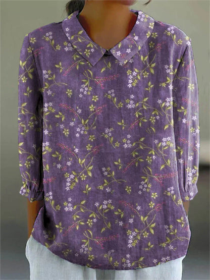 Lavender blouse with yellow-green floral vine print, V-neck and collar, 3/4 sleeves