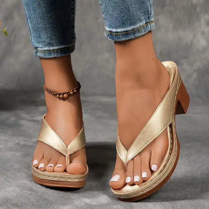 Champagne thong sandals with crisscross straps and chunky block heel