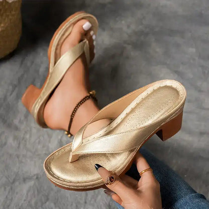 Gold thong sandals with stitched straps and chunky block heel