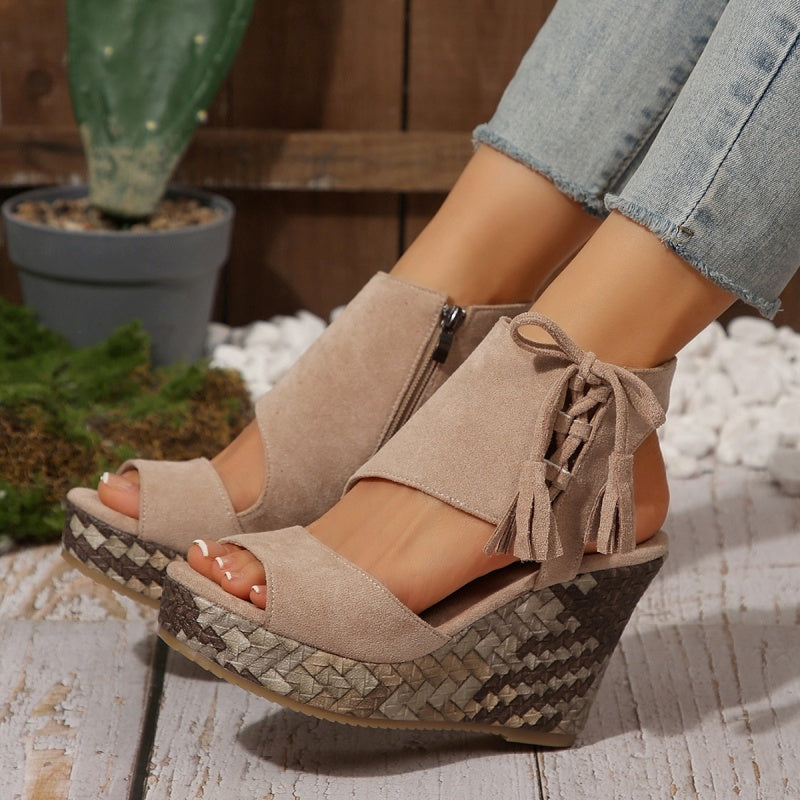 Khaki suede-look ergonomic sandals with tassel lace detail and woven wedge platform