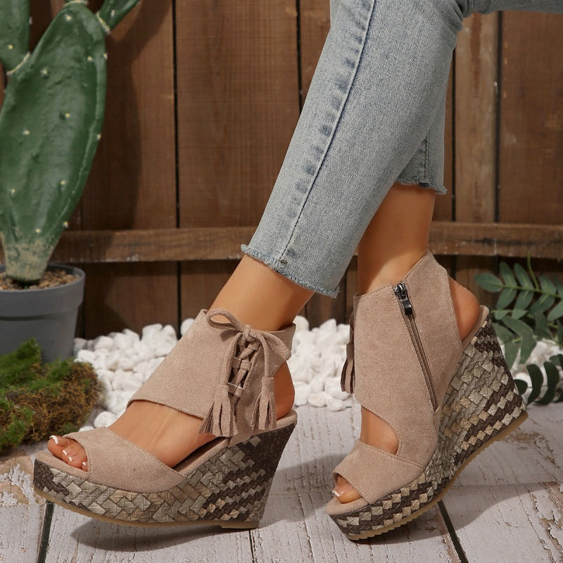 Taupe suede-look ergonomic sandals with tassel laces, ankle zipper, woven wedge