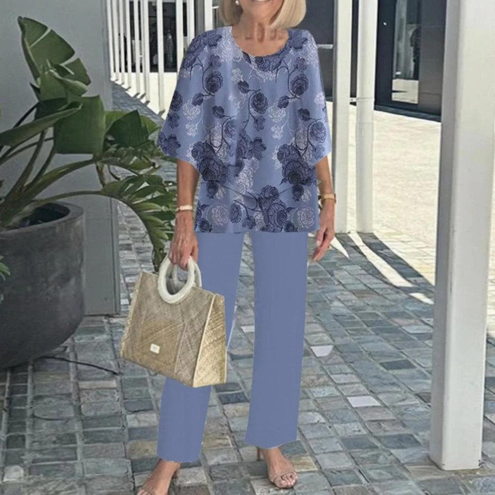 Blue floral two-piece set with short-sleeve top and wide-leg solid blue trousers