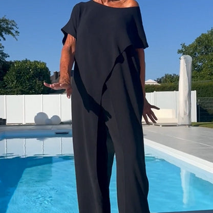 Two-piece set with off-shoulder black top and relaxed wide-leg pants, full length