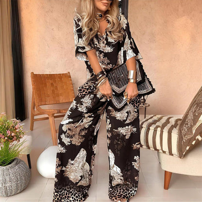 Printed V-neck top and long pants set, black with white floral and animal motifs