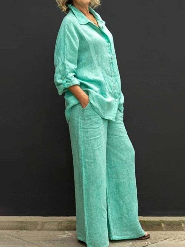Green two-piece set: button-up collared shirt and wide-leg pants with pockets