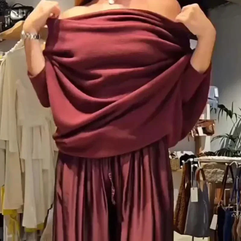 Off-shoulder dress set in deep red with flowing cowl top and pleated maxi skirt folds