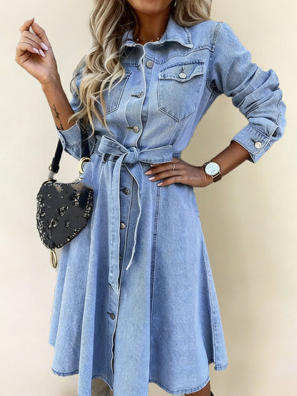 Light blue denim shirt dress with button front, chest pockets, tied waist