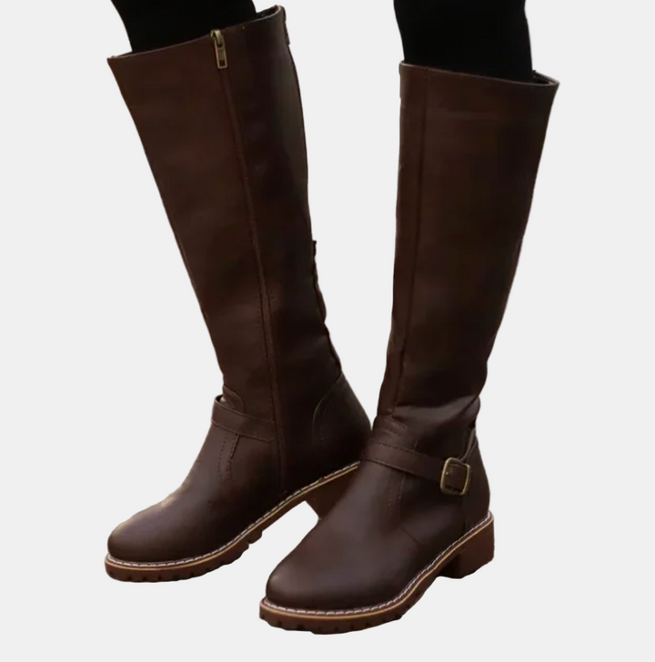 Dark brown tall boots with buckle strap, side zipper, and rubber sole