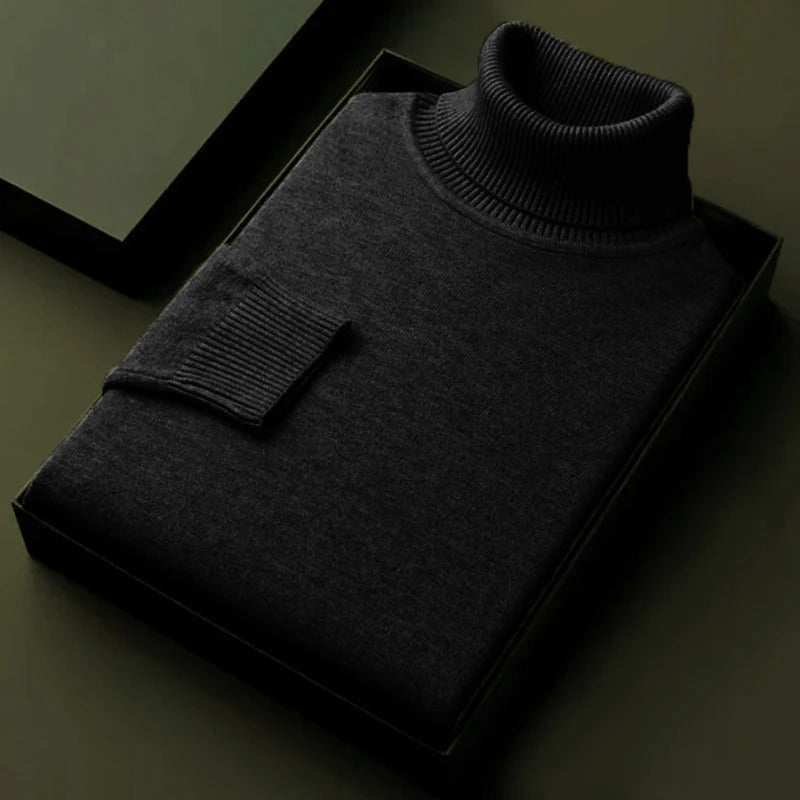 Black soft turtleneck sweater, ribbed collar and cuff on box