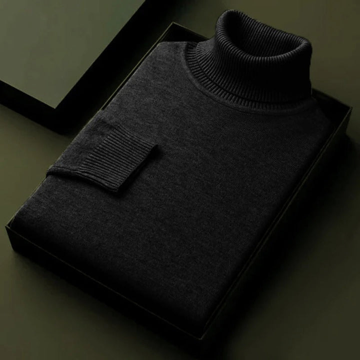 Black soft turtleneck sweater, ribbed collar and cuff on box