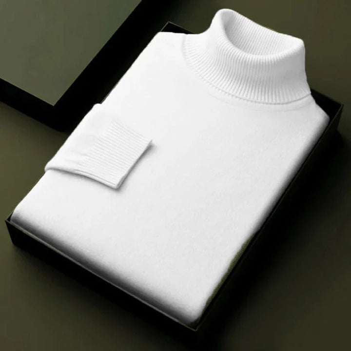 White soft turtleneck sweater, ribbed collar and sleeve cuff on box