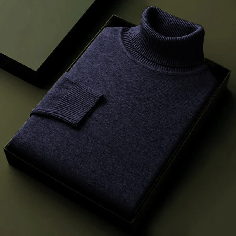 Blue soft turtleneck sweater, ribbed collar and cuff on box