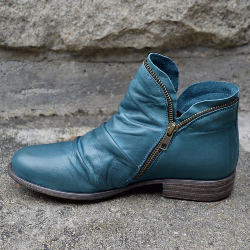 Blue leather ankle boots with side zipper and low block heel