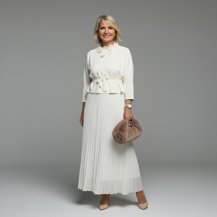 White knit layered dress set with ruffled collar top and pleated midi skirt
