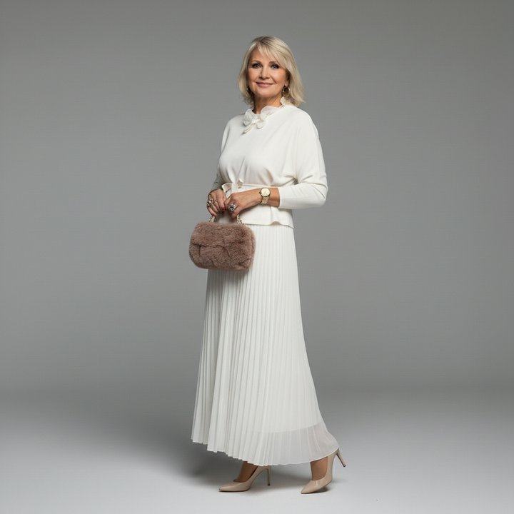 White knit layered dress set with bow-tied waist and pleated midi skirt