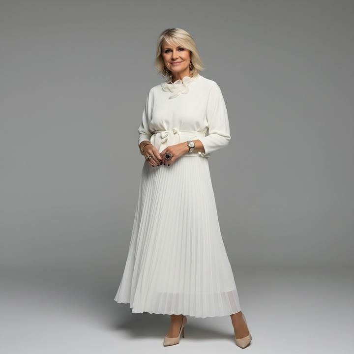 White knit layered dress set with ruffled neck and pleated midi skirt, long sleeves