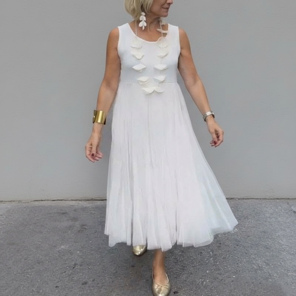White knit dress set with sleeveless bodice, layered flower appliques, pleated tulle midi