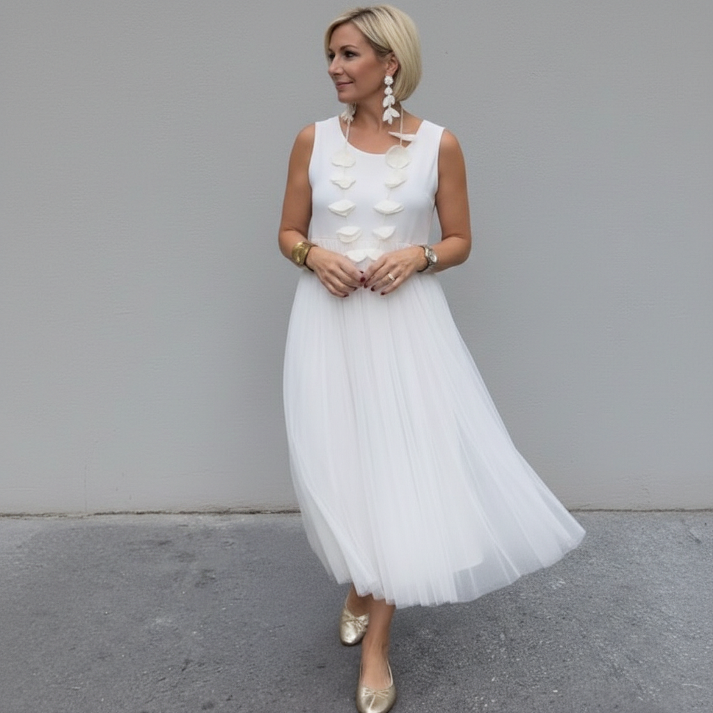 White knit layered dress set with sleeveless top and layered tulle midi skirt