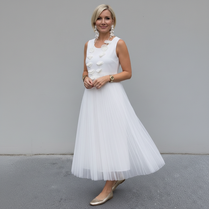 White layered knit dress set with sleeveless top and floral appliques, pleated tulle skirt