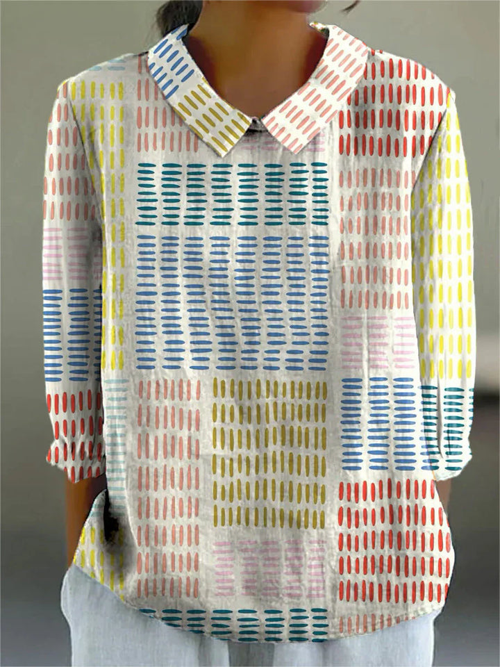 Colorblock dash blouse with multicolor patterned print and buttoned collar